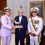 President Asif Ali Zardari presenting a souvenir to Admiral Dr. Muhammad Ali, Chief of the Indonesian Navy, Admiral Naveed Ashraf, Chief of the Naval Staff, Pakistan Navy is also present