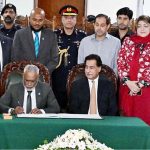 Speaker of the People's Majlis of Maldives Mr. Abdul Raheem Abdulla inscribing his remarks in Visitor Book in Parliament House