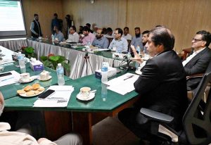 Federal Minister for Railways Muhammad Hanif Abbasi chairs a meeting with staff during his visit to Pakistan Locomotive Factory.