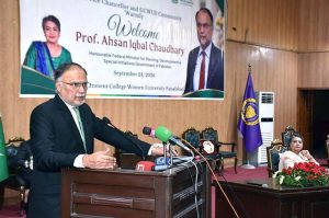Federal Minister for Planning, Development and Special Initiatives Professor Ahsan Iqbal addresses a ceremony at the old campus of Government College Women University Faisalabad (GCWUF).