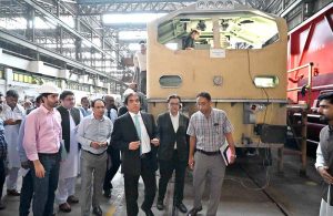 Federal Minister for Railways Muhammad Hanif Abbasi chairs a meeting with staff during his visit to Pakistan Locomotive Factory.
