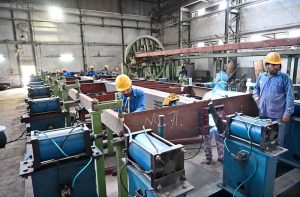Federal Minister for Railways Muhammad Hanif Abbasi chairs a meeting with staff during his visit to Pakistan Locomotive Factory.