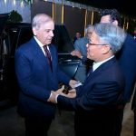 Chinese Ambassador to Pakistan, Jiang Zaidong welcoming Prime Minister Muhammad Shehbaz Sharif upon arrival at the ceremony to celebrate the 77th anniversary of the founding of the People's Republic of China