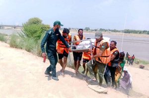 The rescue 1122 team retrieve the bodies of two children reportedly drown while swimming in River Sutlej and handed them over to the relatives.