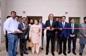 Federal Minister for Planning, Development and Special Initiatives Professor Ahsan Iqbal unveils a plaque to inaugurate the newly constructed building of the new campus of Government College Women University Faisalabad (GCWUF).