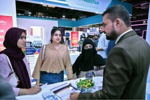 Women visitors gather information while exploring a stall at the 28th ITCN Asia 2026 at the Expo Centre