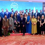 US Consul General Stetson Sanders is posing for a group photo with US consulate staff at the 'Freedom 250' reception held at a local hotel