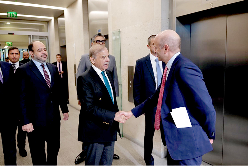 Prime Minister Shehbaz Sharif being received by Chief Executive Officer, David Schwimmer on his arrival at the London Stock Exchange