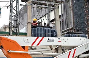 IESCO staffer is busy repairing a power transformer on electric poles to restore electricity supply after a power breakdown in Khayban-e-Sir Syed.