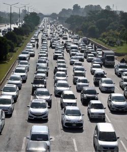 A view of long queues of vehicles stuck in a massive traffic jam on the Islamabad Expressway near Faizabad during peak hours.