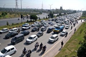 A view of long queues of vehicles stuck in a massive traffic jam on the Islamabad Expressway near Faizabad during peak hours.