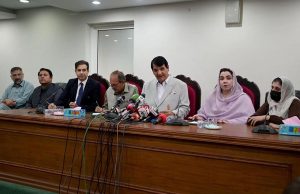 Federal Minister for Kashmir Affairs and Gilgit-Baltistan Engineer Amir Muqam addresses a press conference at the Kashmir Council.