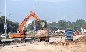 Heavy machinery being used during construction work of Kashmir Chowk underpass during development work in Federal Capital.