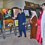 Visitors take a keen interest in artworks displayed at the 21st Annual Quranic Calligraphy Exhibition at the Arts Council