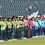 Players of the Pakistan and England cricket teams stand in respect of the national anthems of both countries before the start of the match during the ODI Tri-Nation Series at Rawalpindi Cricket Stadium