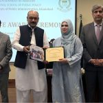 Secretary, Establishment Division, Barrister Nabeel A. Awan presents certificates to participants during the passing-out ceremony of the 47th Mid-Career Management Course at NIPA