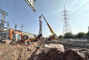 Heavy machinery is deployed for construction work on the Faizabad–Gulberg Greens Service Road project in federal capital.