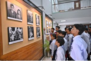 Kamal Khan, grandson of Shaheed-e-Millat Nawabzada Liaquat Ali Khan, views photographs after inaugurating an exhibition marking the 75th death anniversary of the former prime minister at the National Museum of Pakistan.