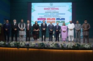 Deputy Prime Minister and Foreign Minister Mohammad Ishaq Dar presents a shield to Parliamentary Secretary Rabia Naseem Farooqi during the 3rd International Seerat Festival, themed “Building Bridges Among Nations,” organized by the National Rahmatul-lil- Alameen wa Khatam-un-Nabiyyin Authority.