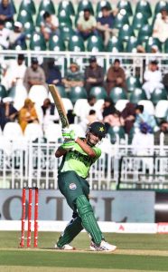 Pakistani batter Babar Azam plays a shot during the ODI Tri-Series match between Pakistan and Sri Lanka at Rawalpindi Cricket Stadium