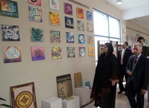 Parliamentary Secretary for Federal Education and Professional Training Rabia Naseem Farooqi and Federal Secretary Nadeem Mahbub view calligraphy artworks during the inauguration of a book fair and calligraphy exhibition at the Institute of Art and Design auditorium in F-11/1.
