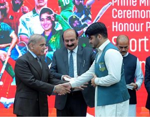 Prime Minister Muhammad Shehbaz Sharif distributes reward cheques amongst the medal winners of the Asian Games