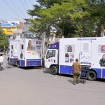 Punjab Police Mobile Station vans parked roadside, offering accessible public services and police assistance to residents
