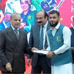 Prime Minister Muhammad Shehbaz Sharif distributes reward cheques amongst the medal winners of the Asian Games
