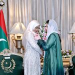 First Lady Bibi Asifa Bhutto Zardari, MNA, pins a pink ribbon on the dress of First Lady of the Republic of Maldives, Madam Sajidha Mohamed, at Aiwan-e-Sadr