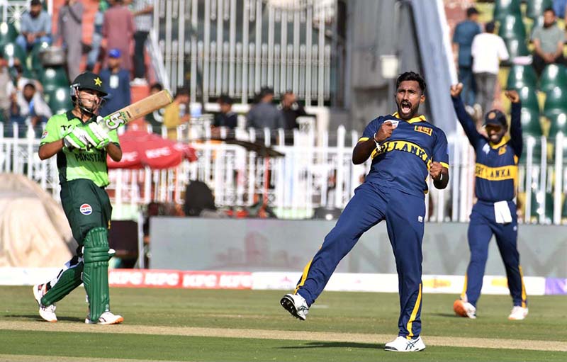 Sri Lankan players celebrate after taking a wicket of Pakistani batter Saad Baig during the ODI Tri-Series match between Pakistan and Sri Lanka at Rawalpindi Cricket Stadium