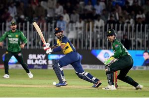 Pakistan’s batter Arafat Minhas plays a shot during the third T20 cricket match between Pakistan and Sri Lanka at Rawalpindi Cricket Stadium