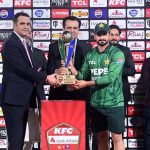 Minister of State for Interior, Talal Chaudhry presents the winning trophy to Pakistan captain Sahibzada Farhan after Pakistan won the three-match T20 series against Sri Lanka 2-1 at Rawalpindi Cricket Stadium