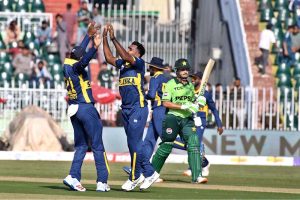 Sri Lankan players celebrate after taking a wicket of Pakistani batter Saad Baig during the ODI Tri-Series match between Pakistan and Sri Lanka at Rawalpindi Cricket Stadium