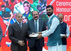 Prime Minister Muhammad Shehbaz Sharif distributes reward cheques amongst the medal winners of the Asian Games