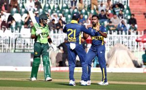 Sri Lankan players celebrate after taking a wicket of Pakistani batter Saad Baig during the ODI Tri-Series match between Pakistan and Sri Lanka at Rawalpindi Cricket Stadium