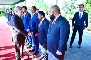 Prime Minister Muhammad Shehbaz Sharif shakes hands with members of the delegation led by the President of the Maldives H.E. Muhammad Muizzu at Prime Minister's House