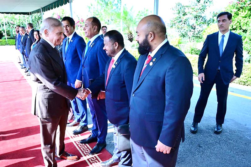 Prime Minister Muhammad Shehbaz Sharif shakes hands with members of the delegation led by the President of the Maldives H.E. Muhammad Muizzu at Prime Minister's House