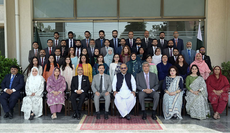 Secretary, Establishment Division, Barrister Nabeel A. Awan in a group photograph with participants during the passing-out ceremony of the 47th Mid-Career Management Course at NIPA