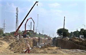 Heavy machinery being used for the construction work of Kashmir Chowk underpass during development work in Federal Capital.