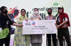 Chairman South Asian Athletics Federation Major General (R) Muhammad Akram Sahi distributes prizes during the Sargodha First Mini Marathon Race 2026