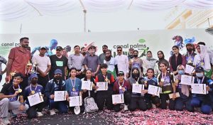 A group photograph of position holders with Chairman South Asian Athletics Federation Major General (R) Muhammad Akram Sahi, President Athletics Federation of Pakistan Brigadier (R) Wajahat Sahi and organizer Ali Mohammad Awan during the prize distribution ceremony of the Sargodha Mini Marathon Race