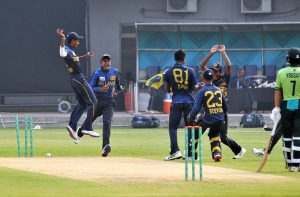 Cricket players in action during the cricket match between Pakistan Under-17 and Sri Lanka Under-17 teams as Pakistan chase a target of 240 runs set by Sri Lanka at Multan Cricket Stadium.