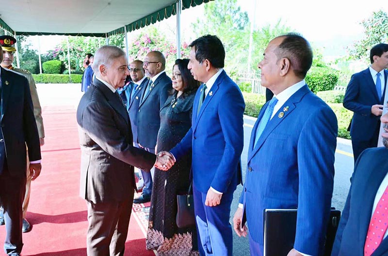 Prime Minister Muhammad Shehbaz Sharif shakes hands with members of the delegation led by the President of the Maldives H.E. Muhammad Muizzu at Prime Minister's House