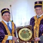 Prof. Dr. Rashid Latif Khan, Vice Chancellor of RLKU, presents a shield to Federal Minister for Planning, Development and Special Initiatives Ahsan Iqbal during the 7th convocation ceremony at Rashid Latif Medical and Dental College