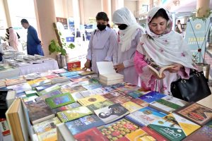 Students and visitors taking keen interest in books at stall setup during 3rd International Seerat Festival, “International Seerat Conference”.
