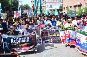 Students of Liaquat University of Medical and Health Sciences (LUMHS) participate in a Kashmir Black Day solidarity walk at the Jamshoro campus to express support for the Kashmiri people and condemn alleged Indian atrocities and the occupation of Kashmir.