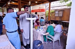 Karachi Press Club members undergo medical screening at a special Cardiac and Pulmonary Health Camp organized by Aga Khan University Hospital in collaboration with the KPC Health Committee