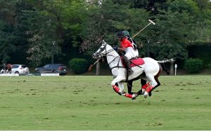 Players in action during the final match of the Serena Polo Cup 2026 between Team HN and Team ASEAN at the Islamabad Club Polo Ground