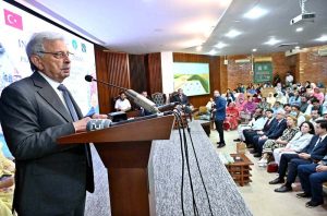 Federal Minister for National Food Security and Research Rana Tanveer Hussain addresses a ceremony marking the inauguration of Pakistan’s first high-tech automatic beeswax foundation sheet preparation unit at the Honeybee Research Institute, NARC