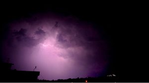 An attractive view of the lighting over the Pakistan Monument as dark clouds hover over the federal capital in the evening